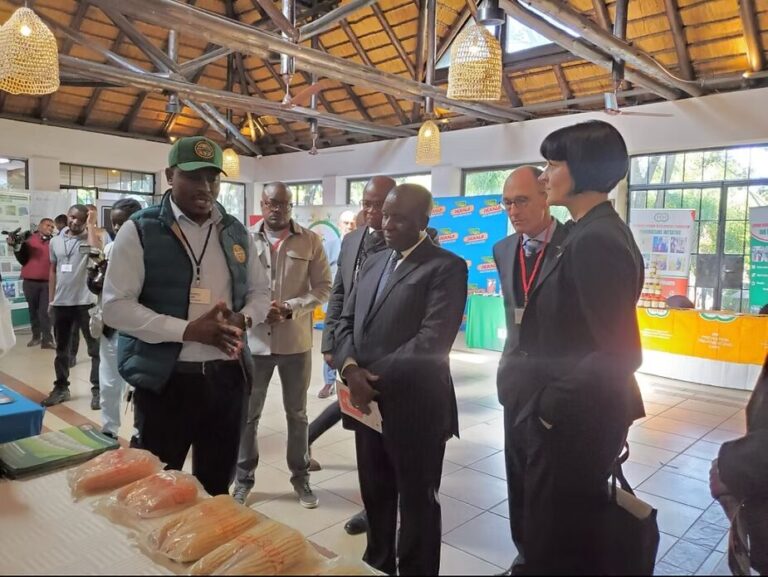 Minister Mtolo Phiri visiting the ZAMSEED stand at the Agrifinance Conference